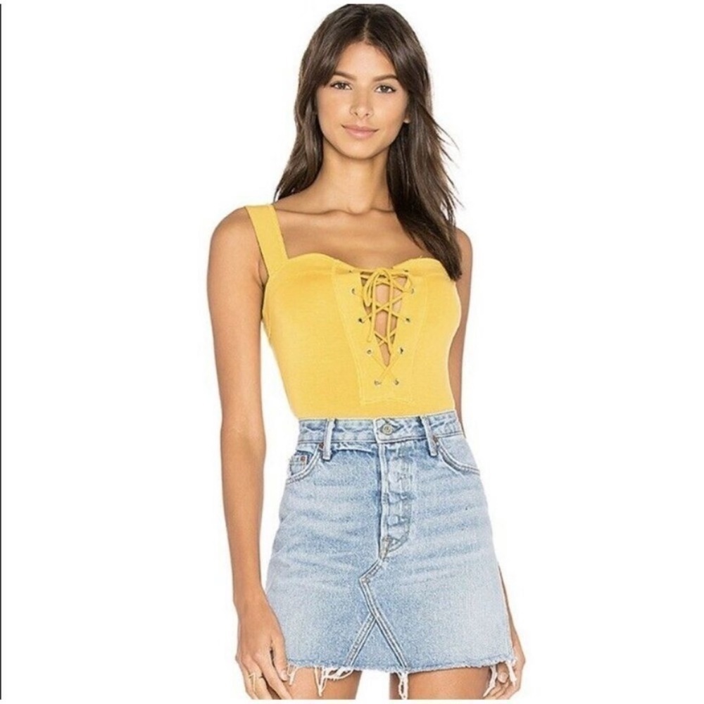 NWT CAPULET Yellow-mustard lace up bodysuit size S